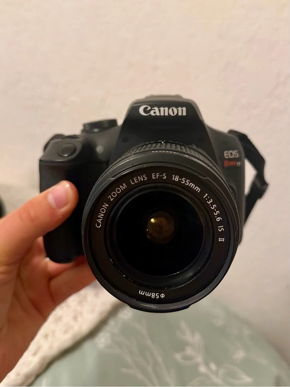 Canon DSLR Camera with Zoom Lens and Black Carrying Bag